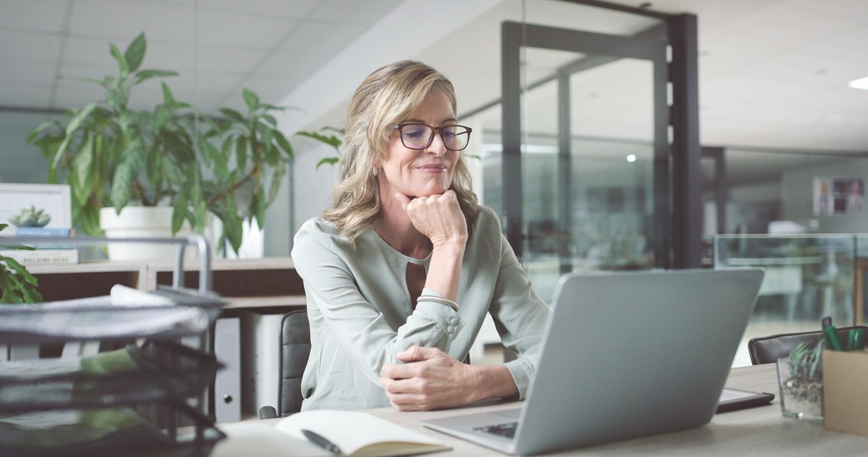 A focused individual working independently on a personal development assignment