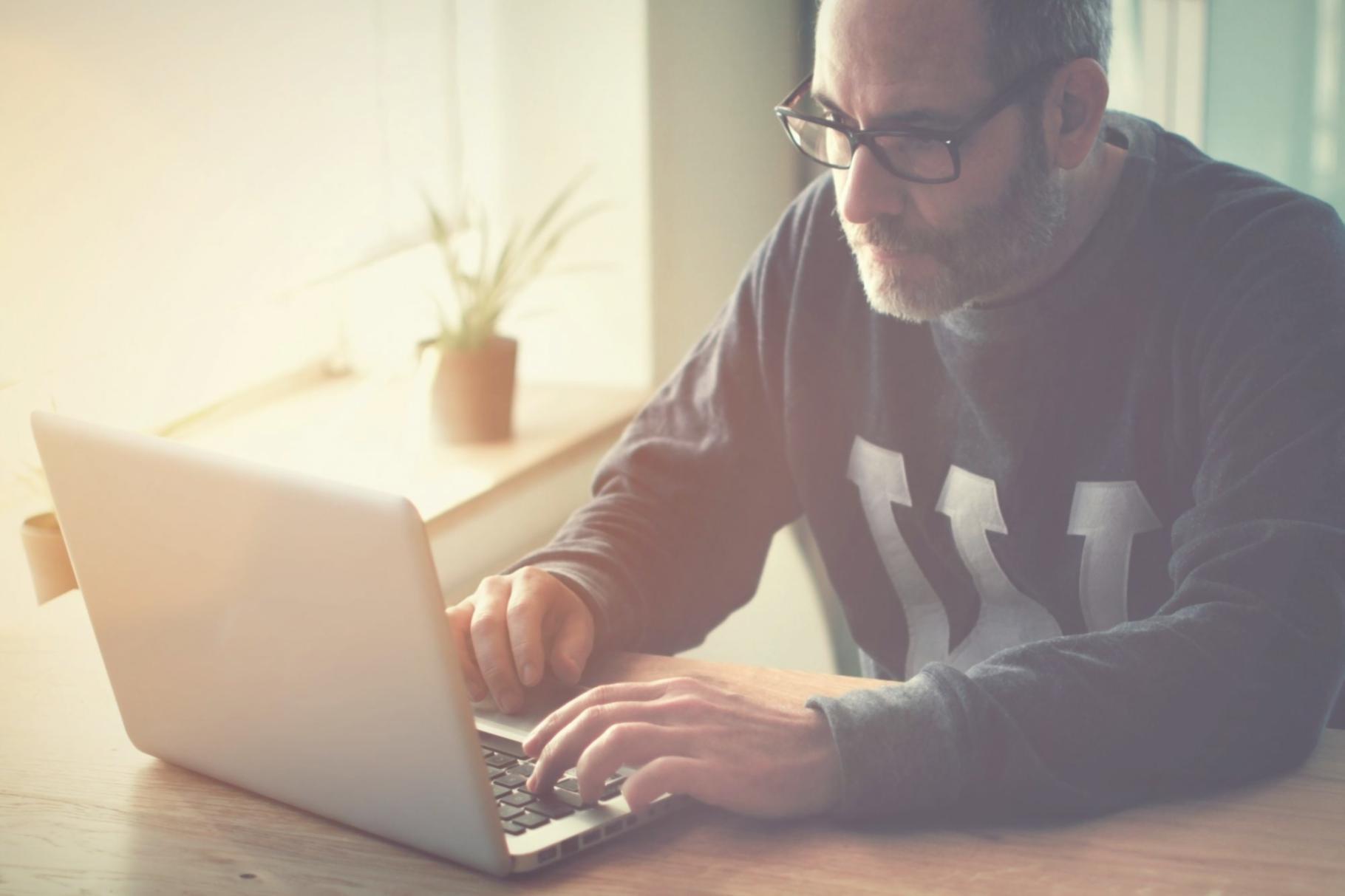 A person applying skills learned in a workshop to a real-life work situation